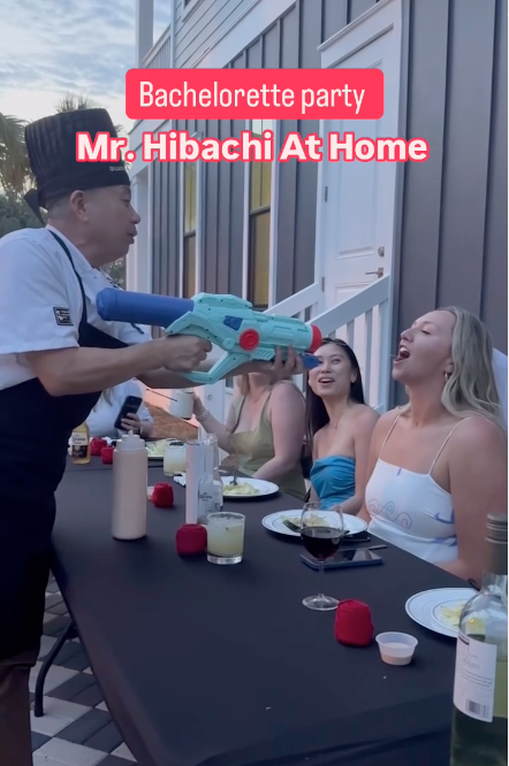 Hibachi chef with a water gun at a bachelorette party